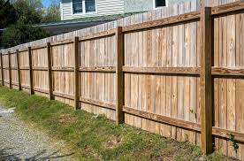 After: repaired and restored fence